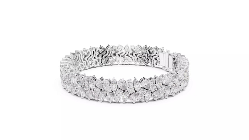 White gold natural diamond bracelet angled view, luxury pear and marquise cluster tennis bracelet