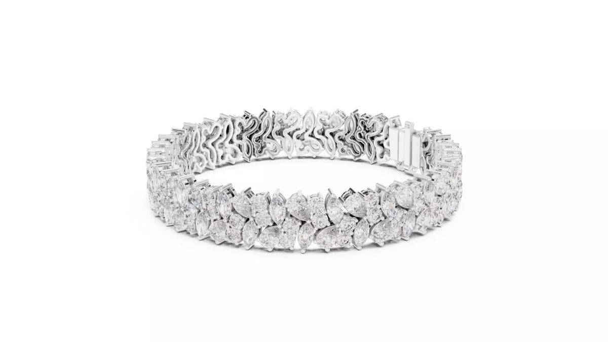 White gold natural diamond bracelet angled view, luxury pear and marquise cluster tennis bracelet