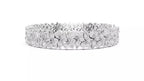 White gold wide diamond tennis bracelet side view with natural pear and marquise cut diamonds