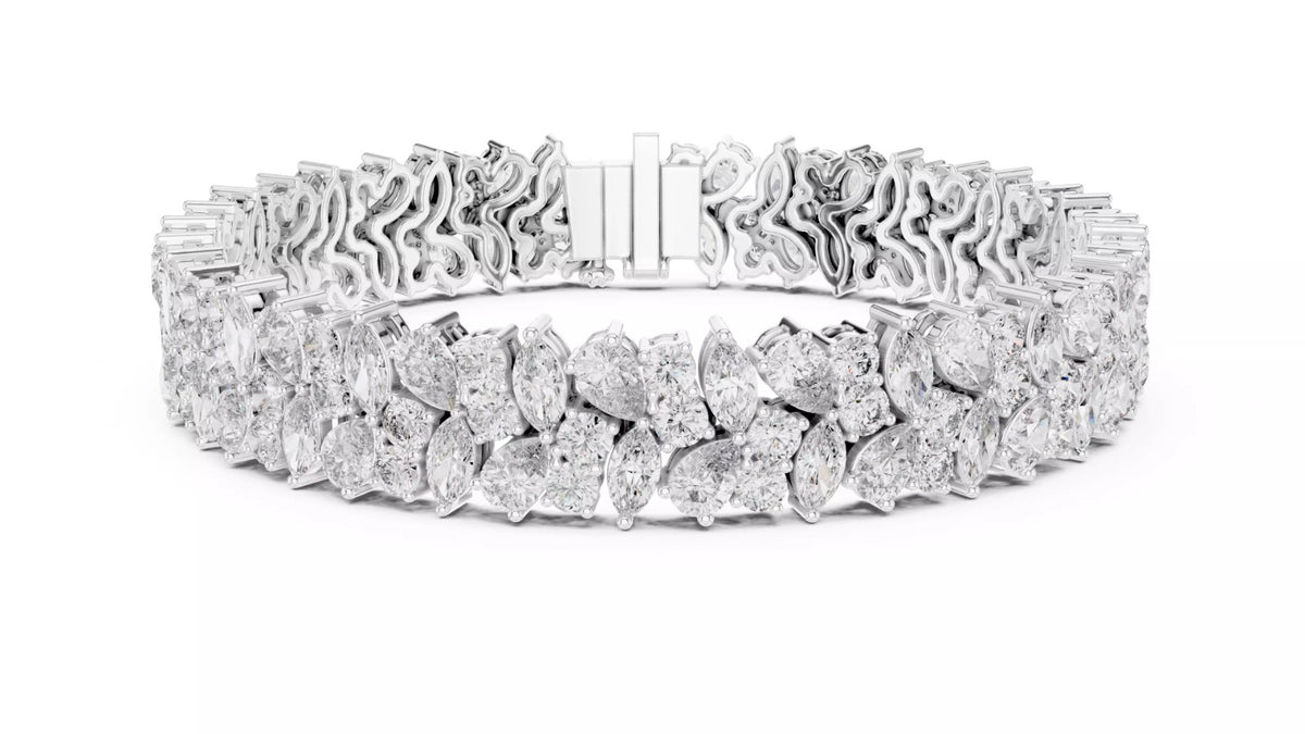 White gold pear and marquise diamond statement bracelet front close-up with box clasp