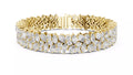 Wide yellow gold statement bracelet with natural pear and marquise cut diamonds, front close-up