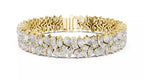 Wide yellow gold statement bracelet with natural pear and marquise cut diamonds, front close-up