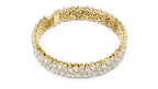 Yellow gold pear and marquise diamond bracelet angled view showing hidden box clasp