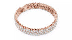 Rose gold marquise and pear diamond bracelet top view showing round shape and clasp