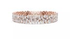 Rose gold wide diamond tennis bracelet side view with natural pear and marquise diamonds