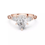 Pear Cut Three Stone Engagement Ring with Pear Side Stones