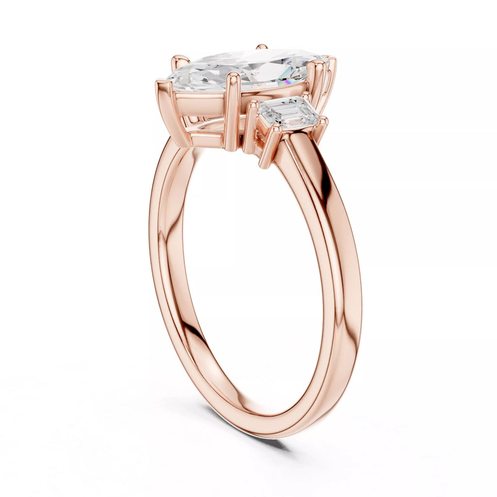 Marquise Cut Three Stone Engagement Ring with Tapered Baguettes