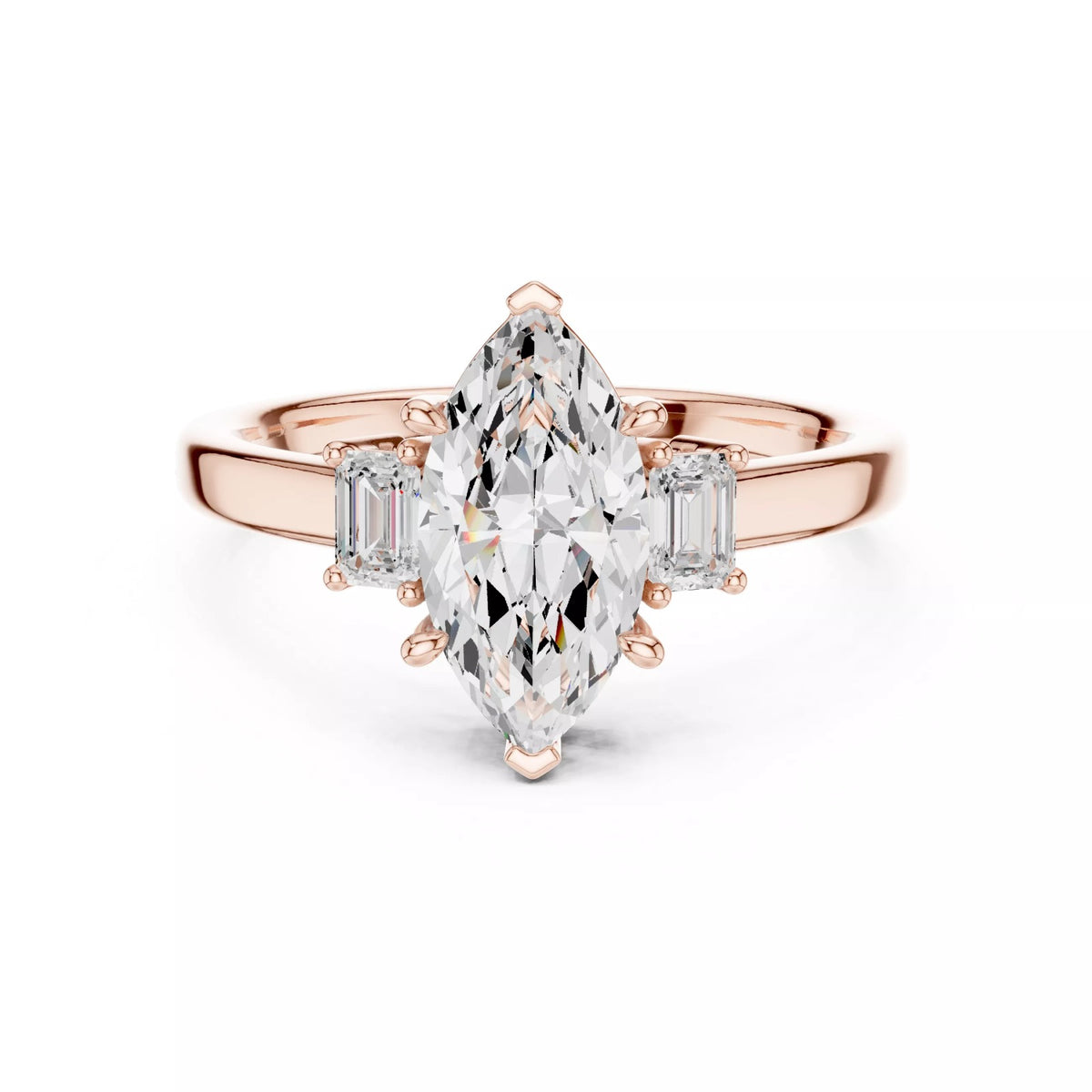 Marquise Cut Three Stone Engagement Ring with Tapered Baguettes