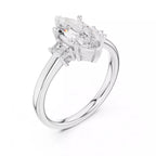 Marquise Cut Three Stone Engagement Ring with Tapered Baguettes