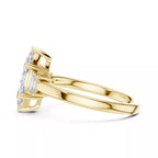Marquise Cut Three Stone Engagement Ring with Tapered Baguettes