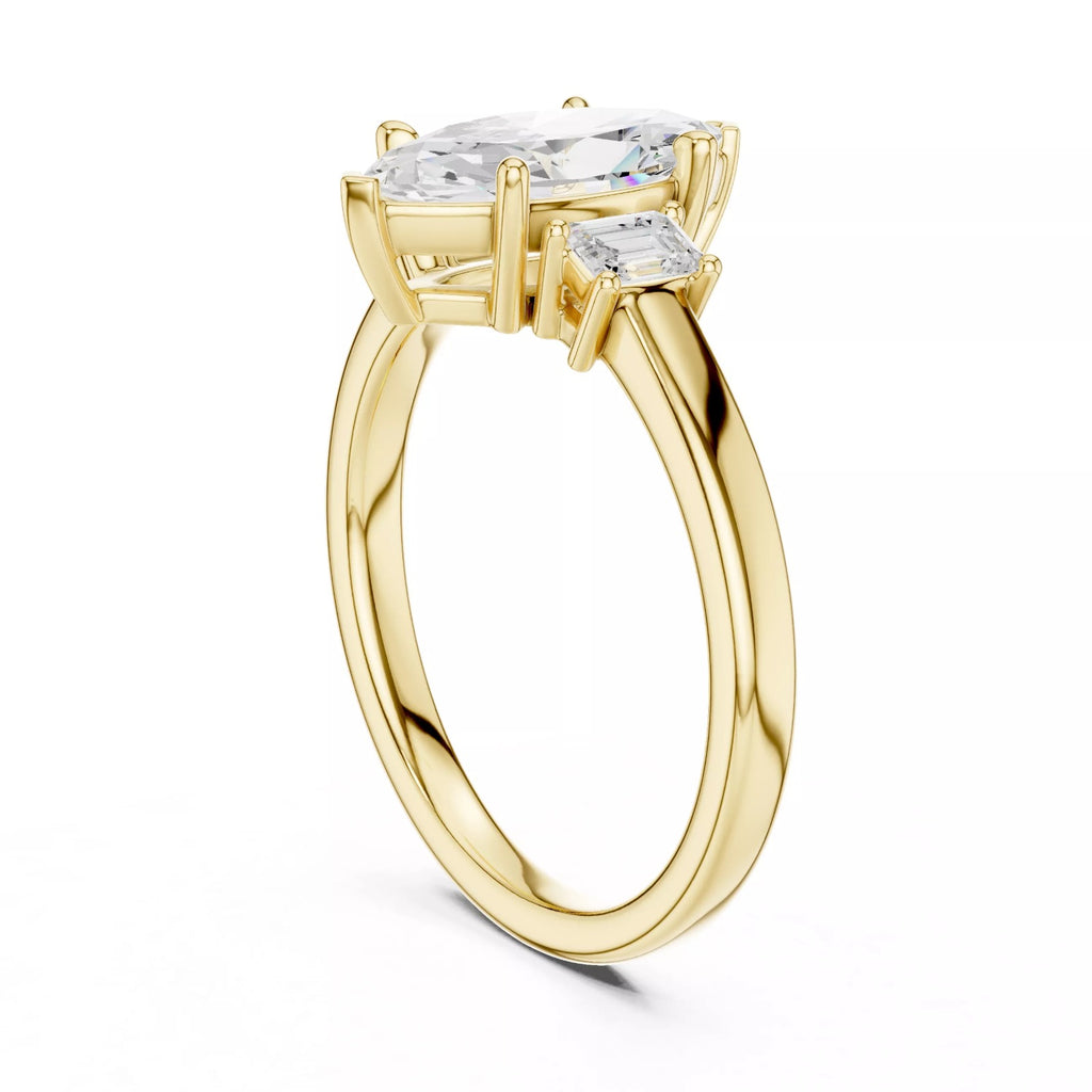 Marquise Cut Three Stone Engagement Ring with Tapered Baguettes