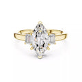 Marquise Cut Three Stone Engagement Ring with Tapered Baguettes