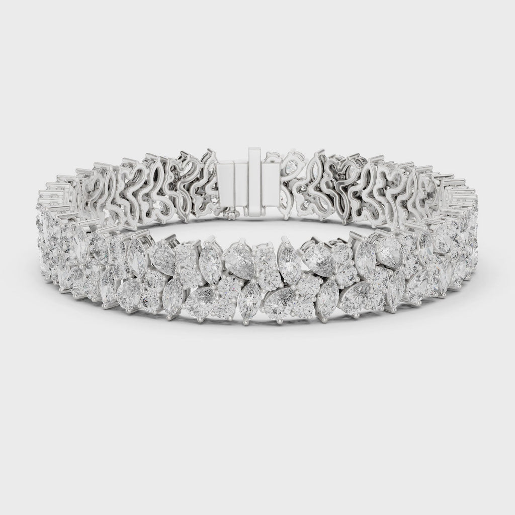 360 video of natural pear and marquise diamond cluster bracelet in white gold by Jewelzit
