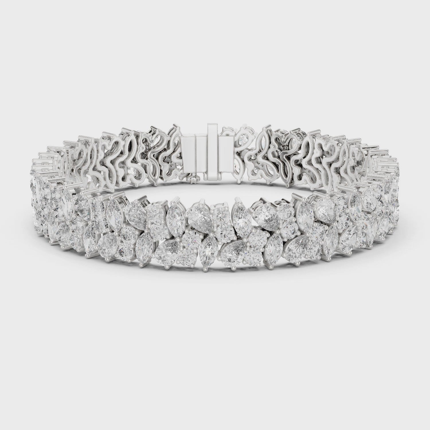 360 video of natural pear and marquise diamond cluster bracelet in white gold by Jewelzit