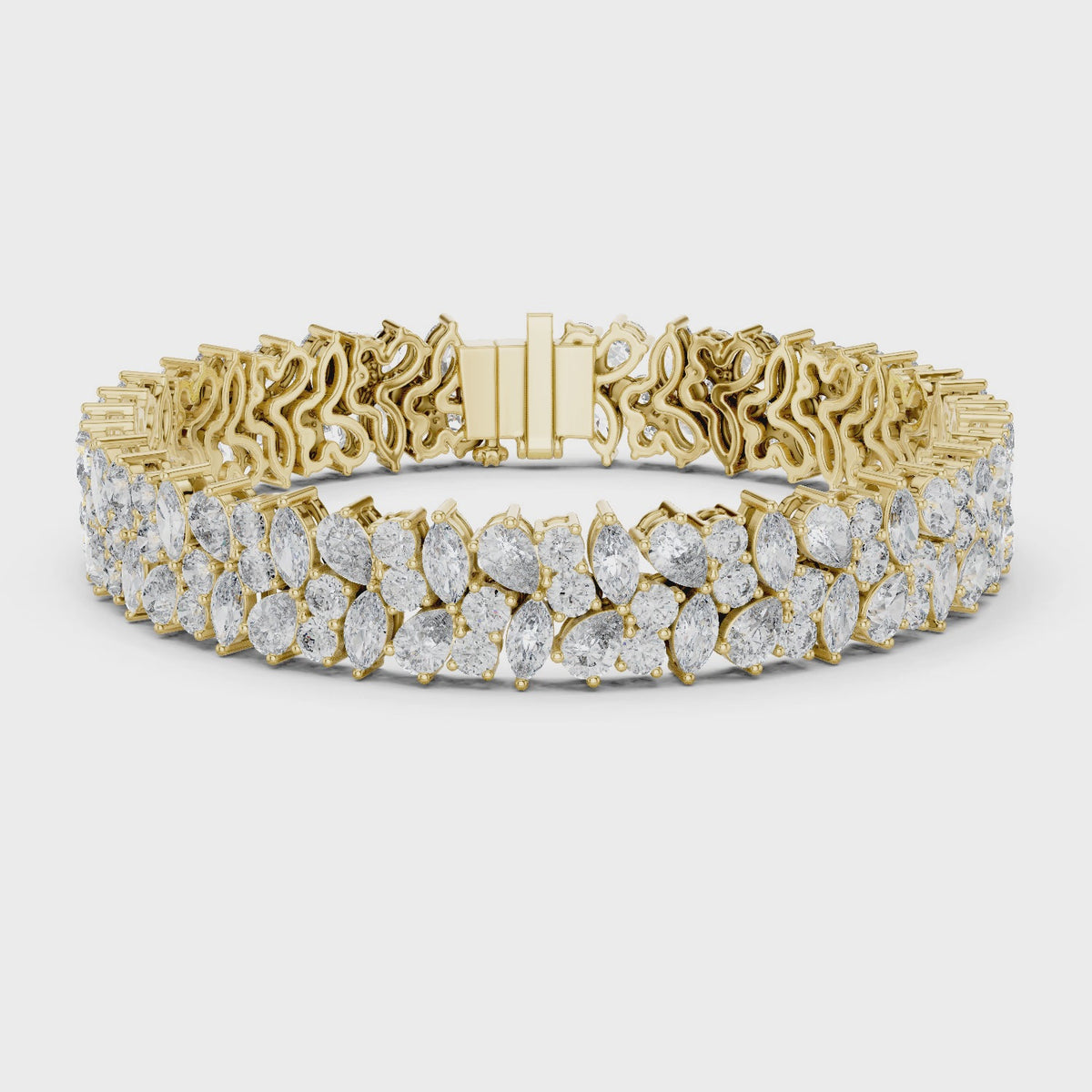 360 video of natural pear and marquise diamond cluster bracelet in yellow gold by Jewelzit