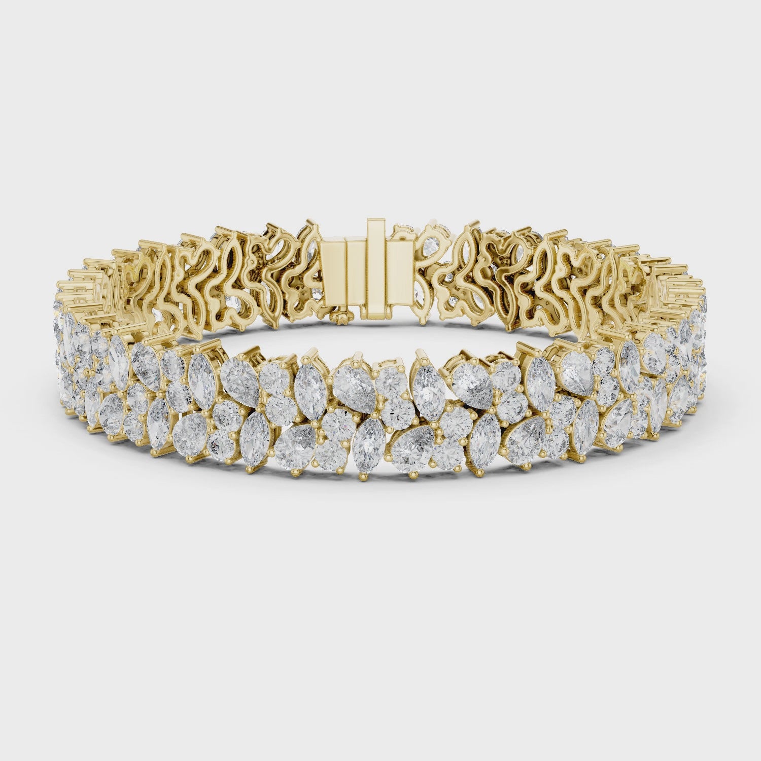 360 video of natural pear and marquise diamond cluster bracelet in yellow gold by Jewelzit