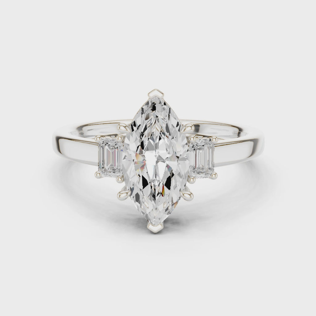Marquise Cut Three Stone Engagement Ring with Tapered Baguettes