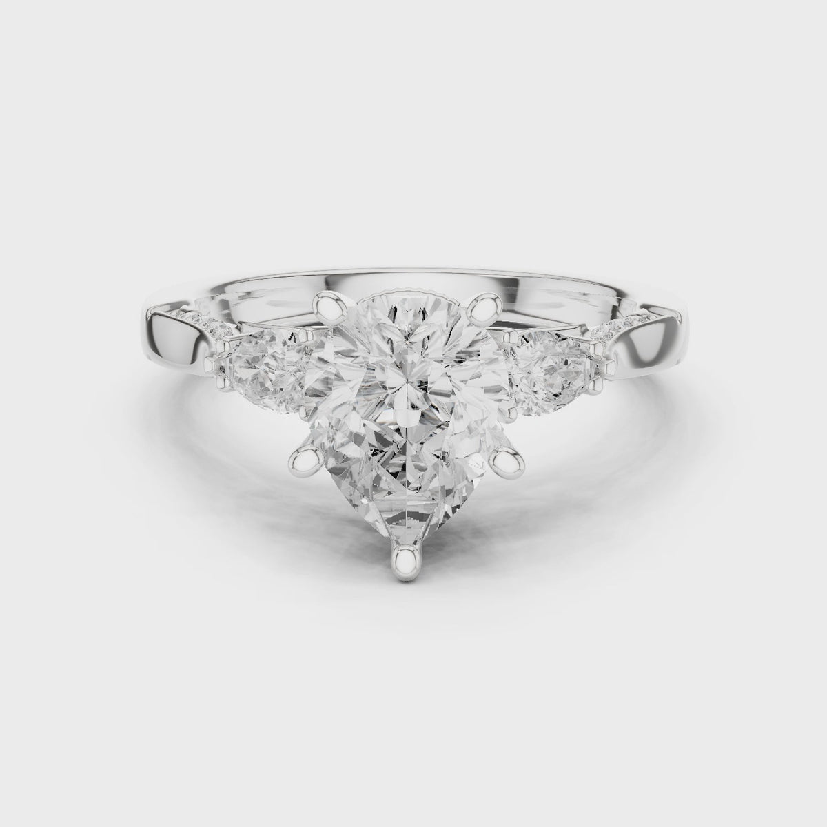 Pear Cut Three Stone Engagement Ring with Pear Side Stones